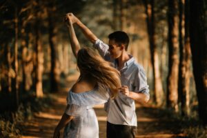 This is a picture of a couple dancing in jungle and it showcases the theme of love in The Modern Break-up. 