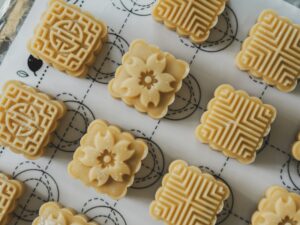 There is a picture of mooncakes that reflects the theme celebration in the Legend of Chnge.